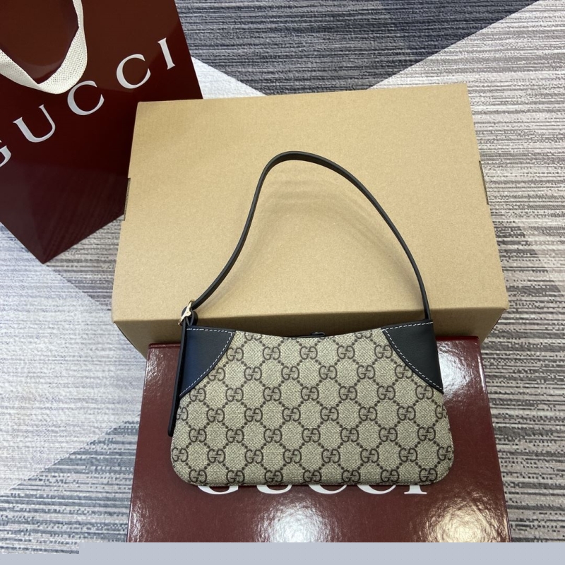 G*u*i top handle bags